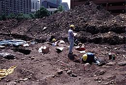 Archaeologists hard at work at Bridgehead; this shows Features 10 and 12
